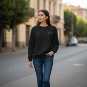 Black sweatshirt with a small logo on a white background